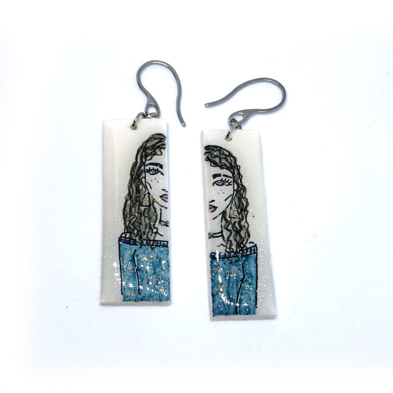 Earrings with a hand painted girl