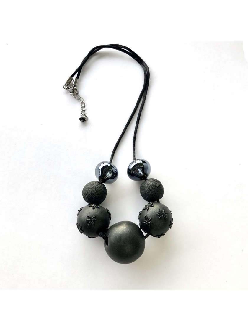 Black necklace with ceramic and polymer beads
