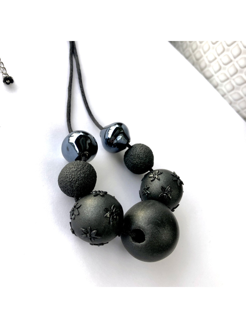 Black necklace with ceramic and polymer beads