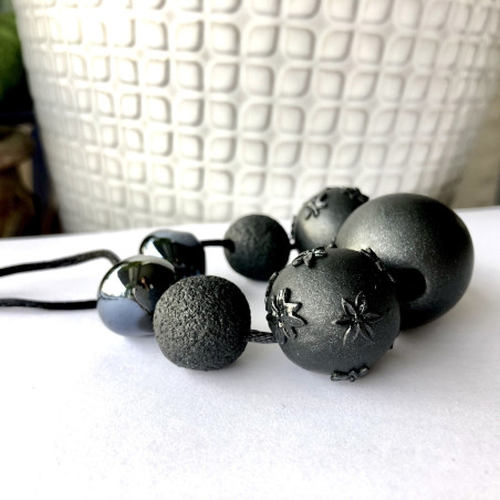 Black necklace with ceramic and polymer beads