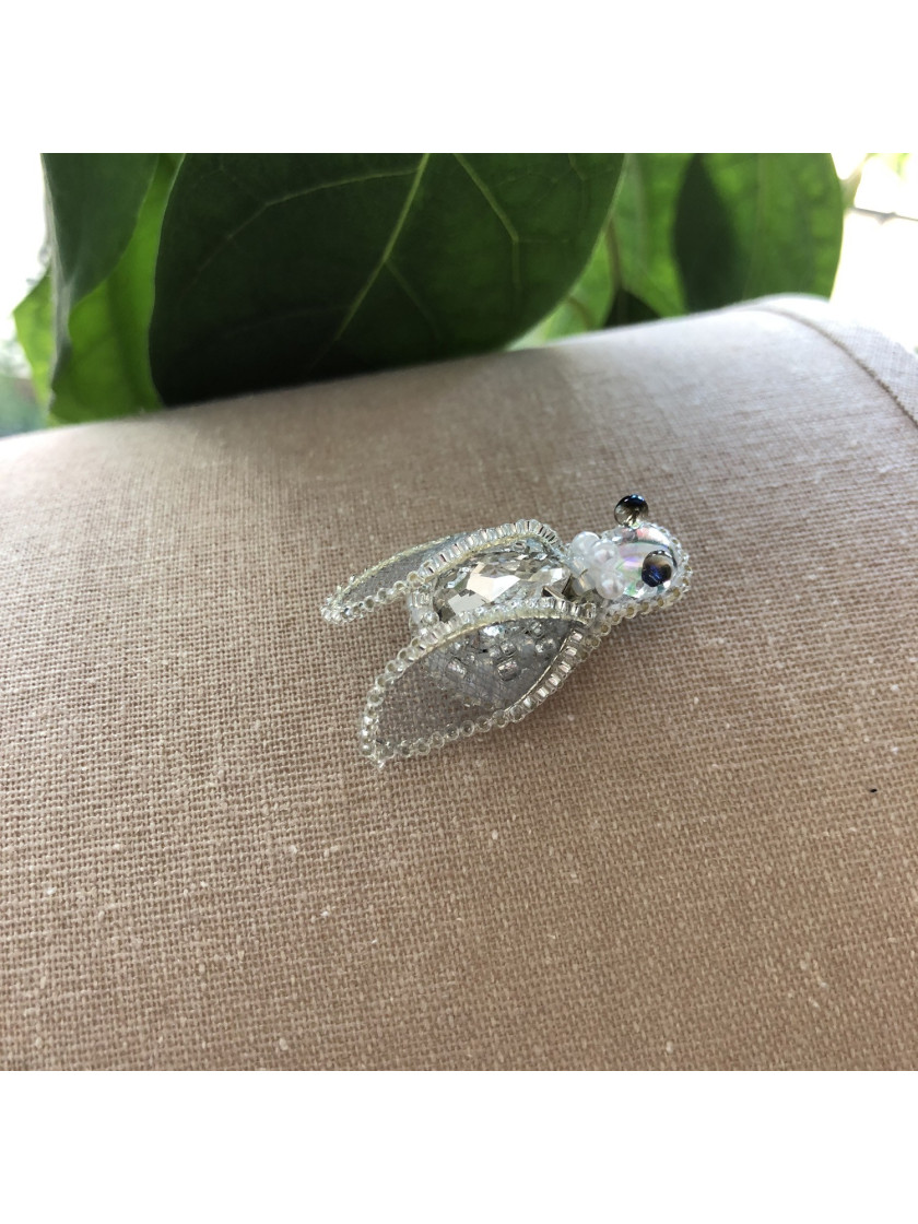 White fly brooch