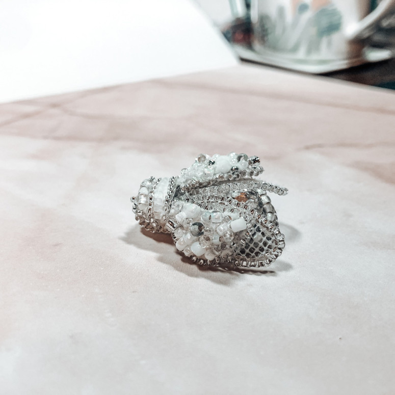 White insect brooch