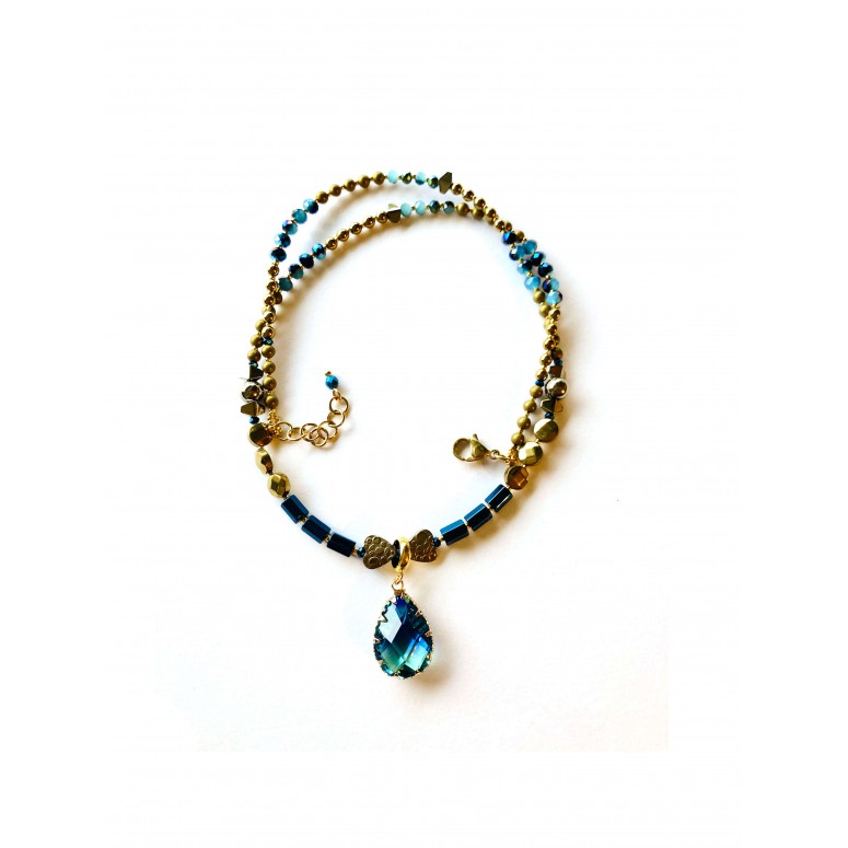 Necklace with a blue crystal