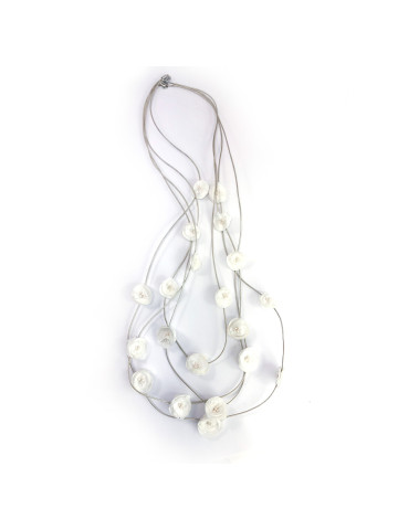 Delicate light and elegant long necklace with sewn flowers.