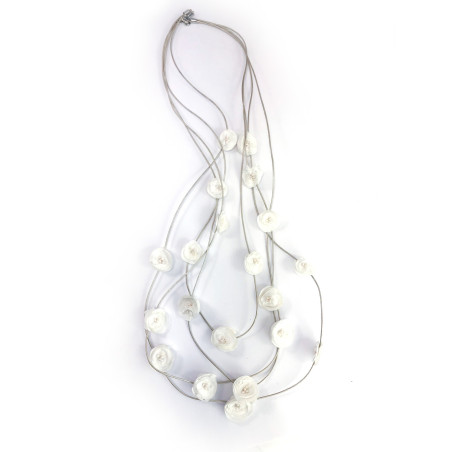 Delicate light and elegant long necklace with sewn flowers.